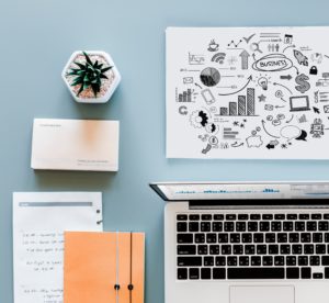 laptop & a piece of paper